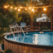 Above ground pool with deck in a cozy backyard – save this summer setup for your own outdoor retreat!