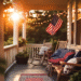 4th of July porch decor with cozy wicker seating, patriotic pillows, and a vintage-style welcome sign — pin this festive front porch idea for later!